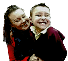 Little boy laughing with woman