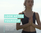 Image of lady in gym gear with hands pressed together